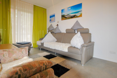 Wohnzimmer Parterre - 1 Zimmer Mehrfamilienhaus, Wohnhaus in Bremen