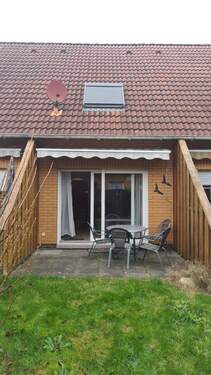 Rückansicht mit Terrasse - 3 Zimmer Reihenmittelhaus zum Kaufen in Varel
