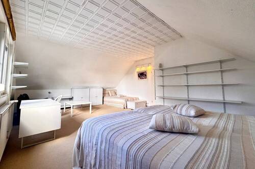 Schlafzimmer im Dachgeschoss - 