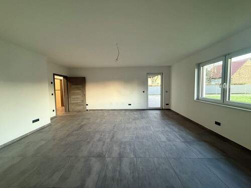 Wohnzimmer - 5 Zimmer Einfamilienhaus zum Kaufen in Heidesee