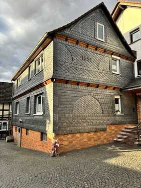 Hauseingang - 1 Zimmer Mehrfamilienhaus, Wohnhaus zum Kaufen in Münchhausen