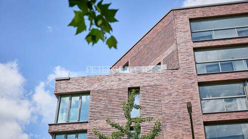 Außenansicht - + Strahlende Lebensqualität - Lichtdurchflutete Wohnung im modernen Neubau +