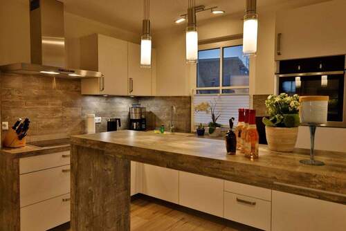 Küche mit Bartheke - Mehrfamilienhaus, Wohnhaus mit 84,00 m&sup2; in Fuhlendorf zum Kaufen