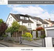 Gepflegtes Ein- Zweifamilienhaus mit ausgebautem DG, Garten und zwei Garagen - Neu-Isenburg