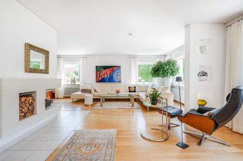 Wohnzimmer - AIGNER - Wohnen auf großzügiger Wohnfläche - Ihr Traumhaus in Vaterstetten wartet!