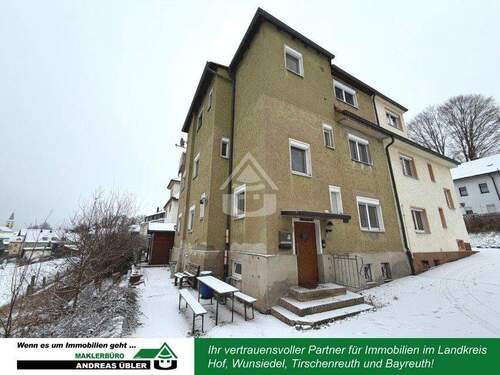 Titelbild - Vermietetes Dreifamilienhaus mit Sanierungsbedarf