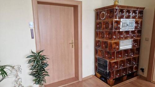 Wohnzimmer mit Kachelofen - 