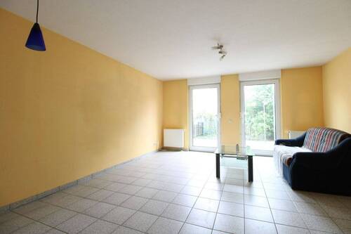 Wohnzimmer - Reihenmittelhaus mit 120,30 m&sup2; in Raunheim zum Kaufen