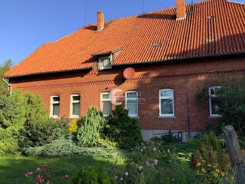 Blick auf Fensterfront - Mehrfamilienhaus, Wohnhaus mit 400,00 m&sup2; in Rätzlingen zum Kaufen
