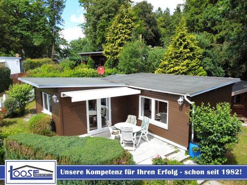 24361 LooseImmo Titel - Logo - Charmantes Wochenendhaus im Grünen in Scharbeutz-Klingberg