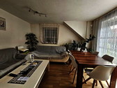 Wohnzimmer - Etagenwohnung mit 60,00 m&sup2; in Gundelfingen zum Kaufen