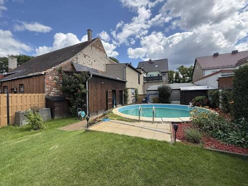 Garten mit Pool - Einfamilienhaus mit 163,00 m² in Annaburg zum Kaufen