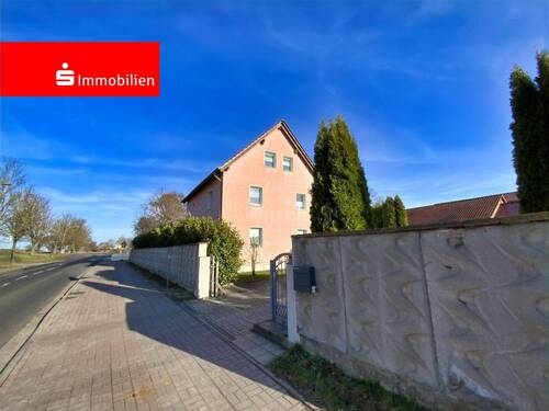 Straßenansicht - Vielseitig nutzbares Einfamilienhaus mit Einliegeroption und traumhaftem Gartenblick!