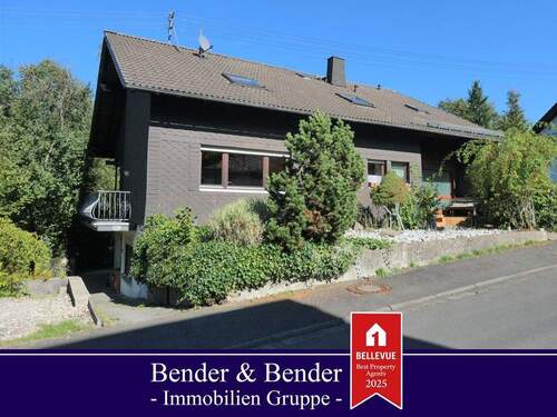 Ansicht Straße - Solides Einfamilienhaus mit Einliegerwohnung und attraktiven Gestaltungsmöglichkeiten!