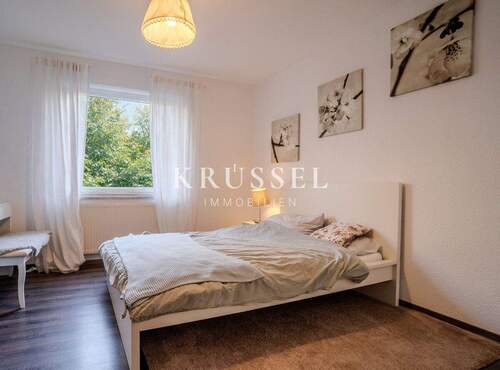 Eins der insgesamt drei Schlafzimmer - 