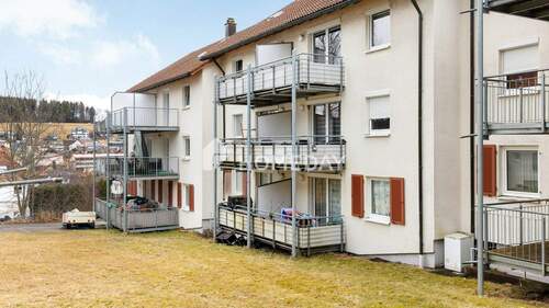 Garten 1 - Ideal geschnittene 2-Zimmer-Erdgeschosswohnung mit Balkon in gepflegtem Mehrfamilienhaus