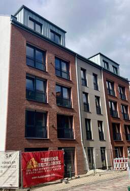 Vorderansicht Wohn-/ Geschäftshaus - Ahlener Marienplatz - Erstbezug in hochwertig-ausgestatteter Neubauwohnung