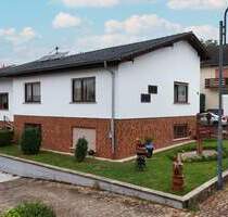 Familienidylle in Sponheim - Bungalow mit Garten, Pool und Einliegerwohnung