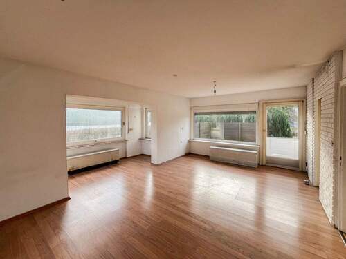 Wohnzimmer EG - 6 Zimmer Einfamilienhaus in Wilnsdorf / Wilgersdorf