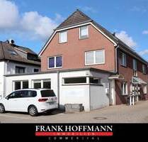 In zentraler Lage! Wohn- Geschäftshaus mit 5 Einheiten & 7 Garagen in Norderstedt