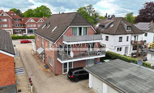 V10912 Außenansicht 1 - 1 Zimmer Mehrfamilienhaus, Wohnhaus zum Kaufen in Norderstedt