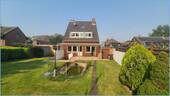 Gartenansicht - Renovierungsbedürftiges Ein- bis Zweifamilienhaus mit Baugrundstück in Rommerskirchen-Butzheim