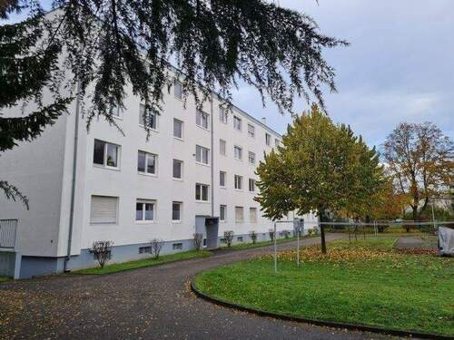 Seitenansicht - Gemütliche 4 Zimmer-Wohnung in begehrter Lage mit Loggia