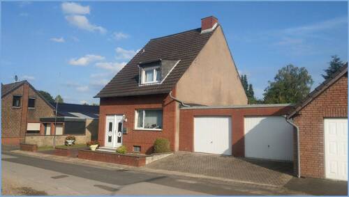 Straßenansicht - Baugrundstück für eine Doppelhaushälfte in Rommerskirchen-Butzheim