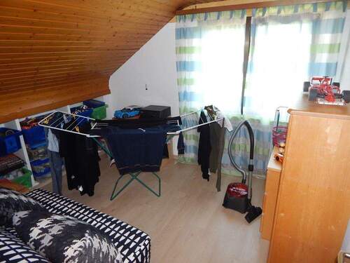 Zimmer im Dachgeschoss - 