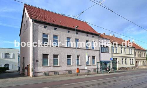 Bild 1 - € 659,26 m² für Wohn- und Geschäftshaus mit stabilen Mieteinnahmen + Steigerungs-Potential