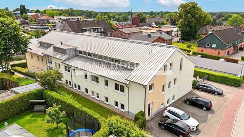 V1250 Außenaufnahme 2 - 2 Zimmer Mehrfamilienhaus, Wohnhaus in Kisdorf