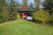 Einfahrt mit Doppelcarport - 