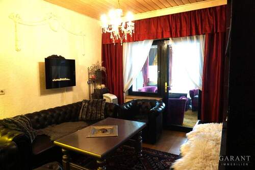 Wohnzimmer - Doppelhaushälfte mit 62,00 m&sup2; in Altensteig zum Kaufen