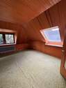 Obergeschoss hinteres Zimmer - 