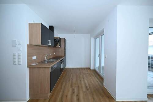 Küche mit Balkonzugang - 