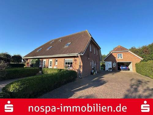 Hausansicht - Einfamilienhaus mit Einliegerwohnung in ruhiger Feldrandlage