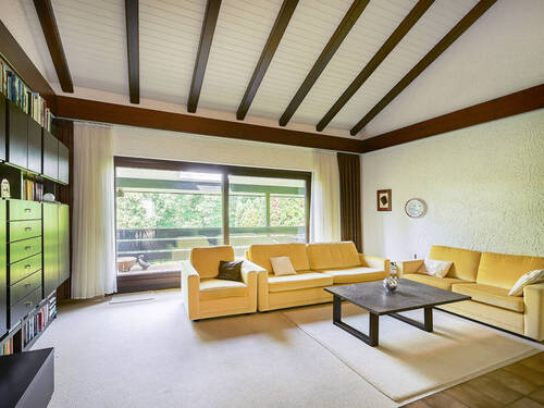 Wohnzimmer Ansicht 1 - 6 Zimmer Einfamilienhaus zum Kaufen in Marxzell / Pfaffenrot