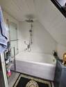 Badezimmer mit Wanne - 