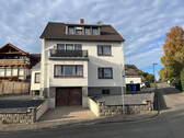 Ansicht vorne mit Garage - Freistehendes Mehrfamilienhaus in Niederbieber - provisionsfrei -