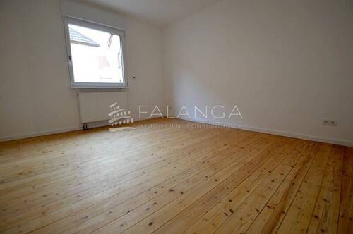 Wohnzimmer mit Dielenboden - Etagenwohnung mit 51,00 m&sup2; in Mainz / Drais zur Miete