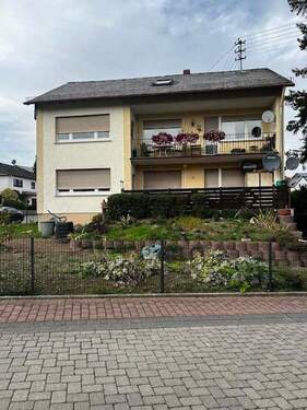 Bild 2 - 8 Zimmer Mehrfamilienhaus, Wohnhaus zum Kaufen in Hünstetten-Kesselbach