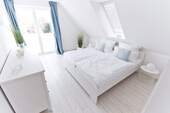 Schlafzimmer 1 mit Meerblick - 
