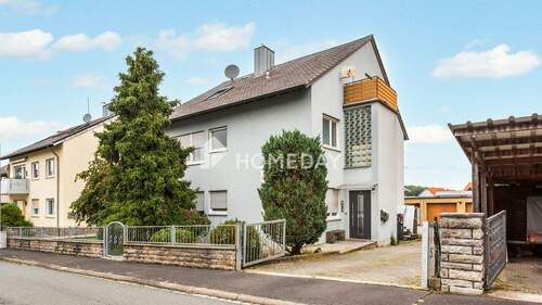 Außenansicht 2 - Vielseitiges Einfamilienhaus mit zwei Wohneinheiten, Garagen und Nebengebäude in ruhiger Lage