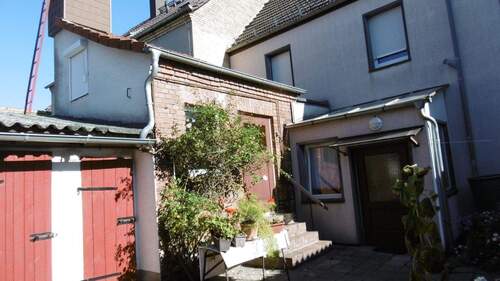 Waschküche und Abstellmöglichkeiten - 