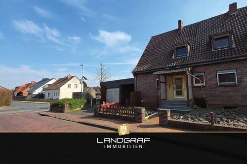 Doppelhaushälfte - Charmante Doppelhaushälfte mit Potenzial auf tollem Endgrundstück mit Keller und Carport!