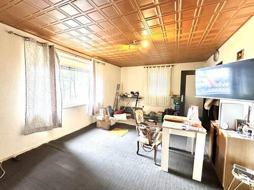 Wohnzimmer - Doppelhaushälfte mit 120,00 m² in Langenhagen zum Kaufen