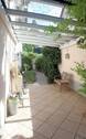 Terrasse West mit Glasüberdachung - 