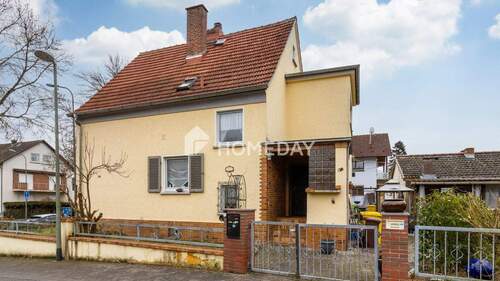 Außenansicht 1 - Einfamilienhaus mit Wintergarten, Garage und großem Garten in ruhiger Lage