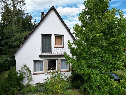 Hausansicht Straße - Einfamilienhaus mit 85,00 m² in Rodenberg zum Kaufen