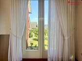 Wohnzimmer mit Blick in den Garten - 